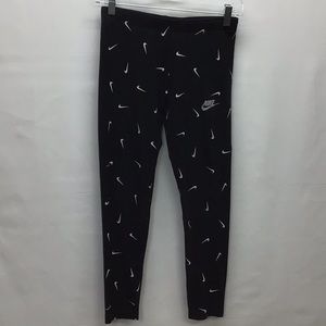 Nike 'tight fit' black leggings w all-over white swooshes